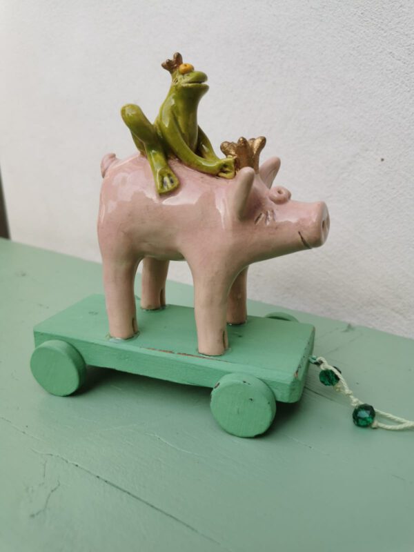 Frosch auf Schwein – Bild 3